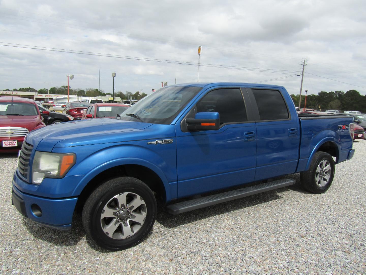 2011 Blue /Gray Ford F-150 FX2 SuperCrew 5.5-ft. Bed 2WD (1FTFW1CF1BK) with an 5.0L V8 engine, Automatic transmission, located at 15016 S Hwy 231, Midland City, AL, 36350, (334) 983-3001, 31.306210, -85.495277 - Photo#2